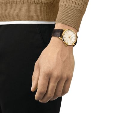Montre Tissot Classic Dream quartz couleur or jaune cadran ivoire bracelet cuir marron 42 mm T129.410.36.261.00