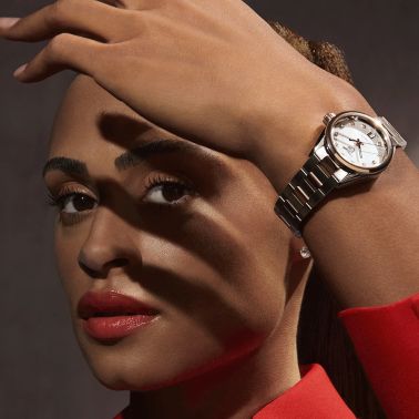 TAG Heuer Carrera Calibre 9 automatic watch with diamond markers white mother-of-pearl dial steel and rose gold bracelet 29 mm