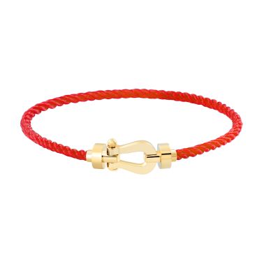 Bracelet Fred Force 10 moyen modèle en or jaune et câble rouge