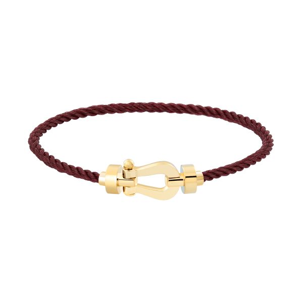 Bracelet Fred Force 10 moyen modèle en or jaune et câble grenat