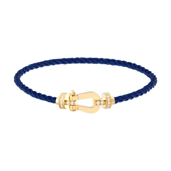 Bracelet Fred Force 10 moyen modèle en or jaune, diamants et câble bleu marine