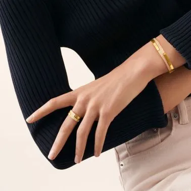 Jonc dinh van Seventies PM en or jaune et diamants 323211