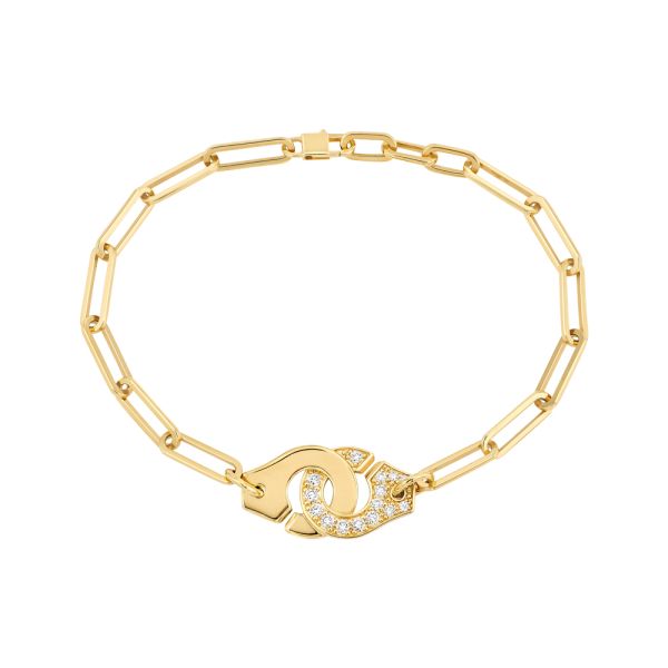 Menottes dinh van R12 bracelet in yellow gold and diamonds