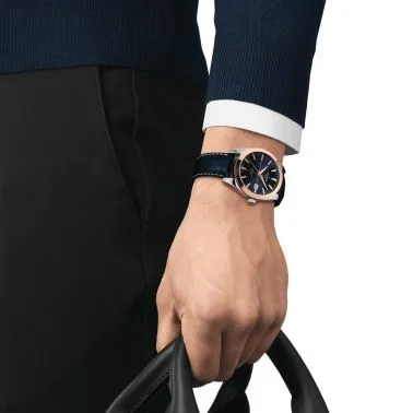 Montre Tissot Gentleman Powermatic 80 Silicium Solid Or Rose cadran bleu bracelet cuir bleu 40 mm T927.407.46.041.00