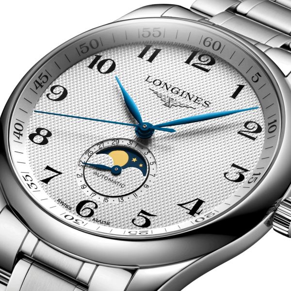 Montre Longines Master Collection automatique cadran argenté phases de lune bracelet acier 42 mm L2.919.4.78.6