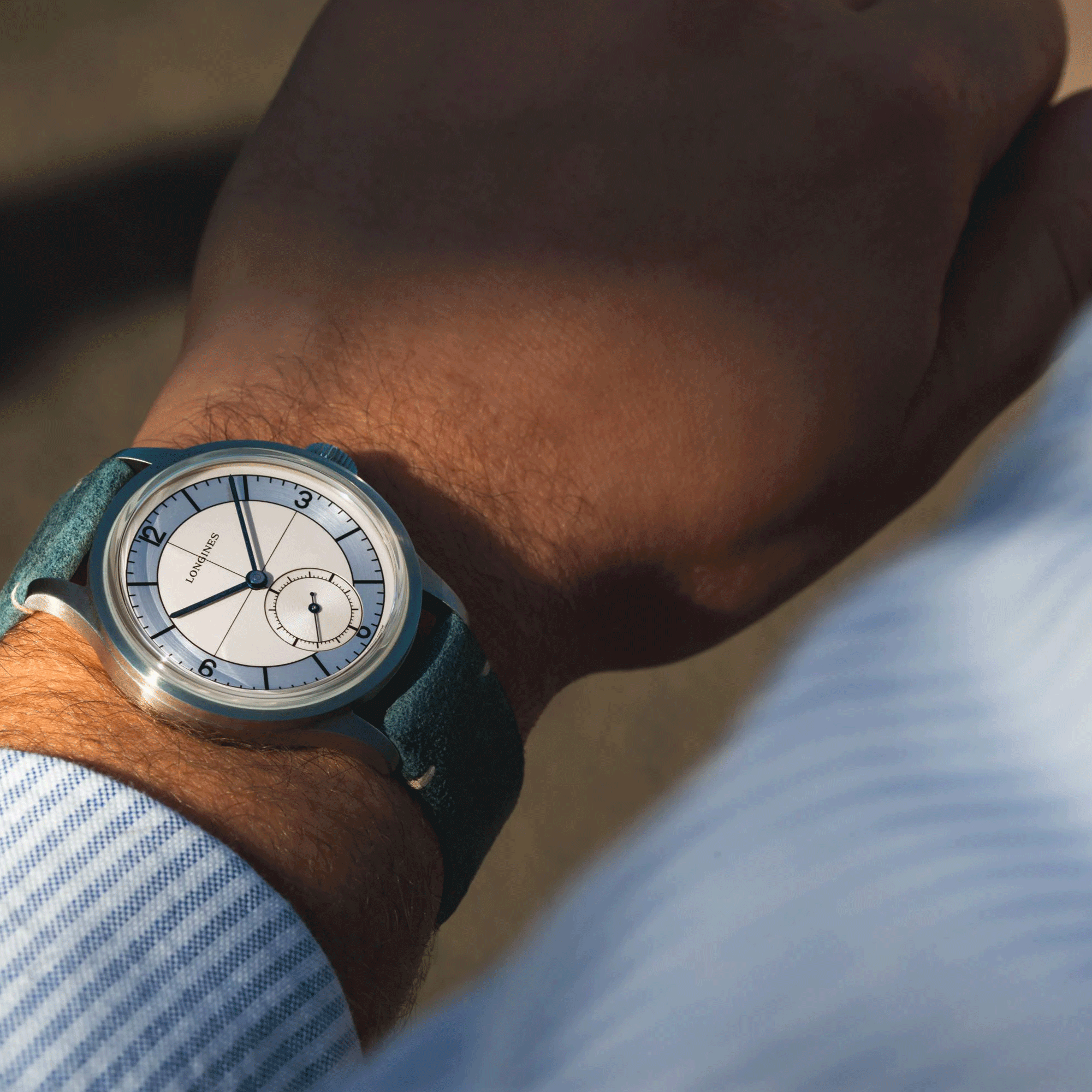 Montre Longines Heritage Classic automatique cadran beige bracelet cuir bleu 38,5 mm L2.828.4.73.2