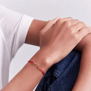 Dior Dioramour bracelet on red cord in yellow gold and diamond