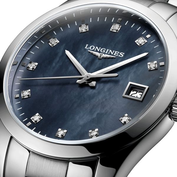 Montre Longines Conquest Classic quartz cadran nacre noire index diamants bracelet acier 34 mm L2.386.4.88.6