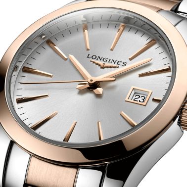 Montre Longines Conquest Classic quartz cadran argenté bracelet bicolore 29.50 mm L2.286.3.72.7