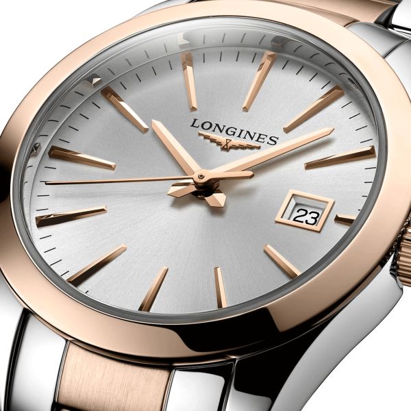 Montre Longines Conquest Classic quartz cadran argenté bracelet bicolore 29.50 mm L2.286.3.72.7