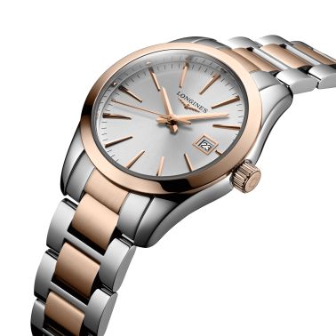 Montre Longines Conquest Classic quartz cadran argenté bracelet bicolore 29.50 mm L2.286.3.72.7