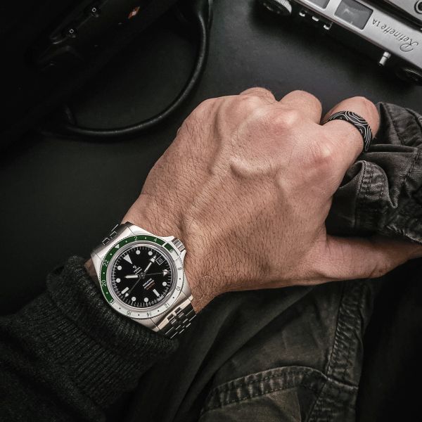 Yema Superman 500 GMT automatic watch green and white bezel black dial steel bracelet 39 mm