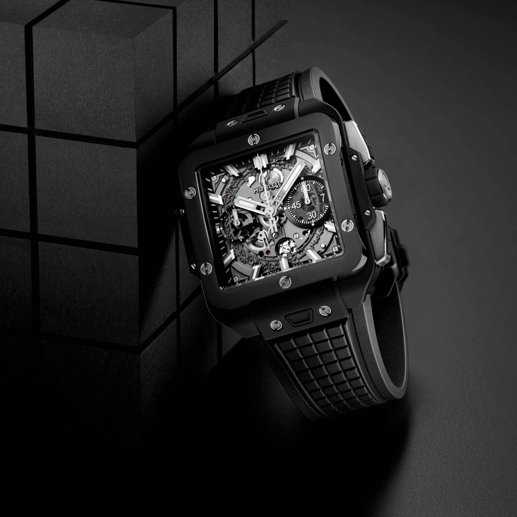 Montre Hublot Square Bang Unico Black Magic automatique cadran squelette bracelet caoutchouc noir 42 mm 821.CI.0170.RX