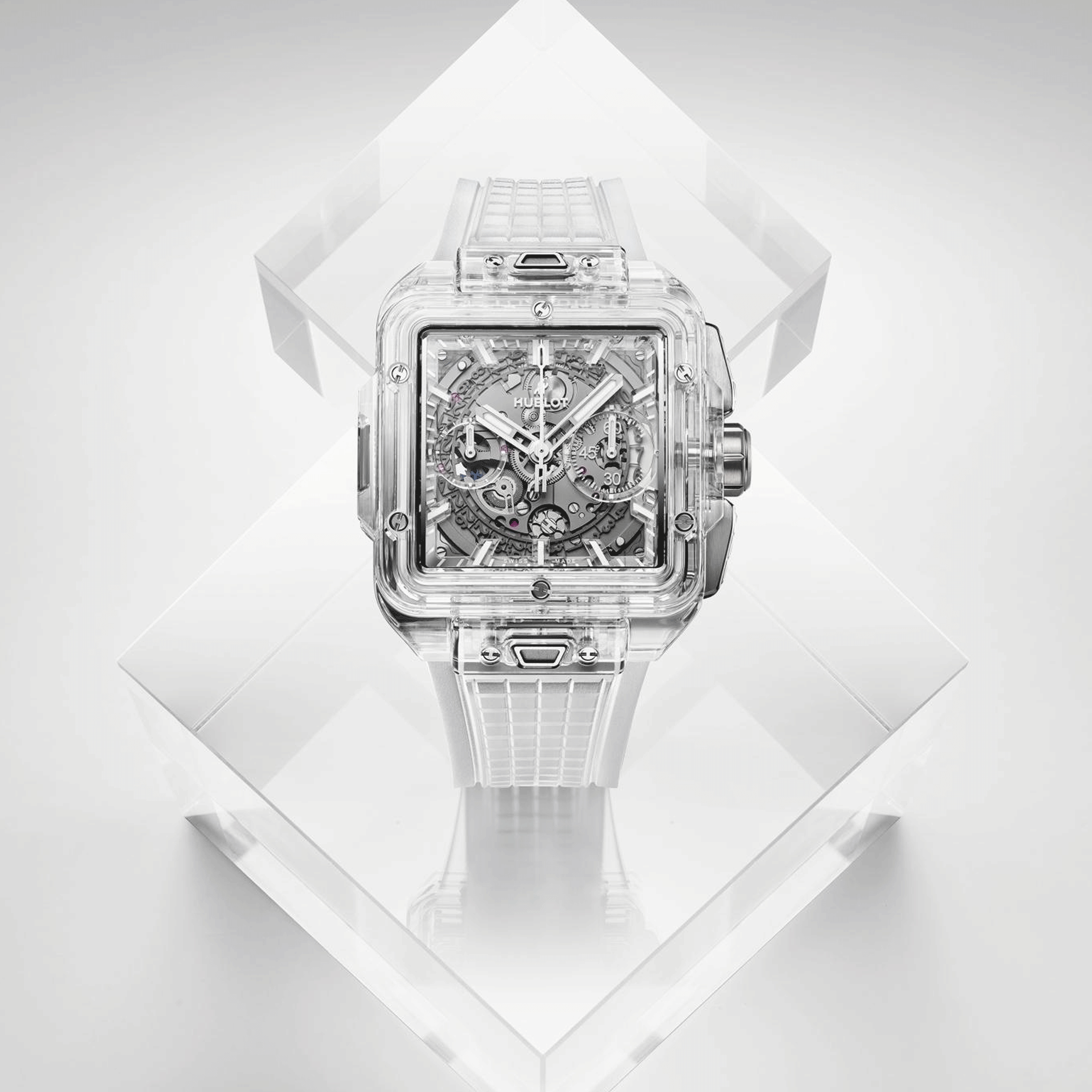 Montre Hublot Square Bang Unico Sapphire automatique cadran squelette bracelet caoutchouc blanc 42 mm 821.JX.0120.RT