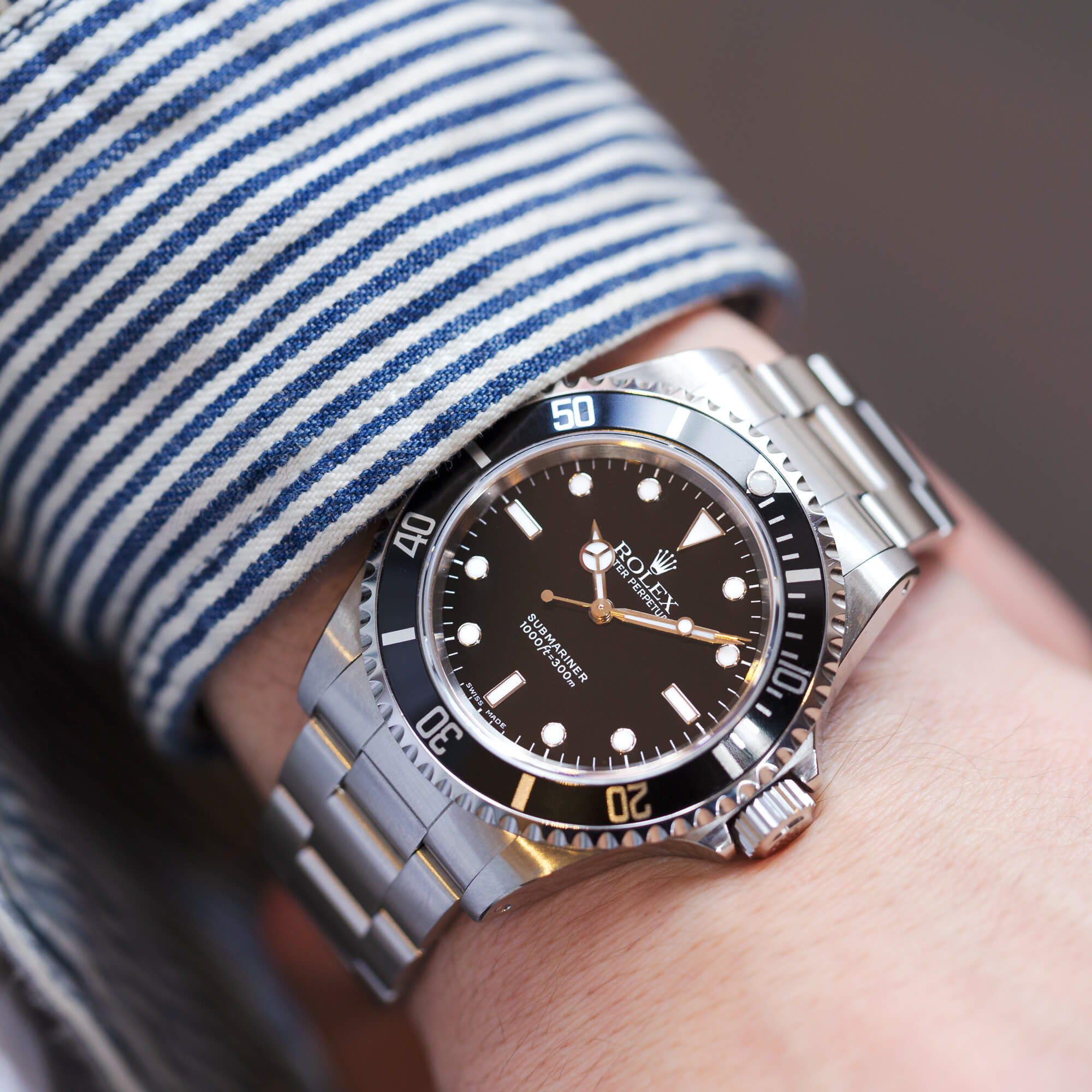 Montre Rolex Submariner 14060 automatique 40 mm 1999 avec Watch Certificate