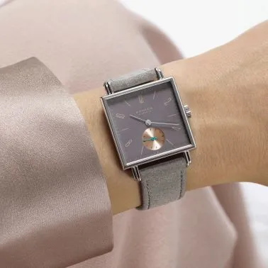 Montre Nomos Tetra Die Kapriziöse mécanique fond acier inoxydable cadran mauve bracelet velours gris 29,5 mm 425