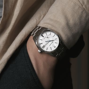 Montre Grand Seiko Heritage Spring Drive "Snowflake" cadran blanc bracelet titane 41 mm