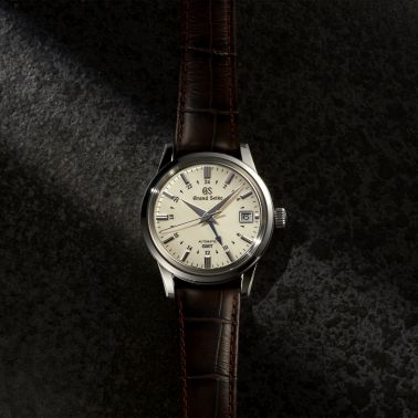 Montre Grand Seiko Elegance automatique GMT cadran ivoire bracelet cuir crocodile brun 39,5 mm