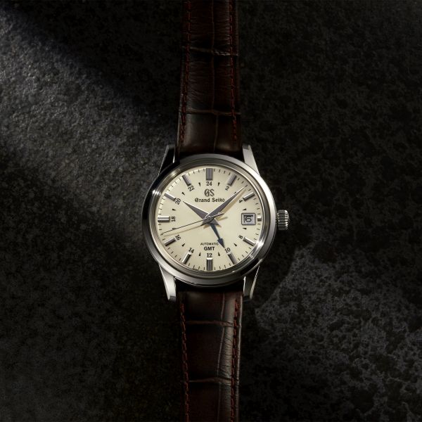 Montre Grand Seiko Elegance automatique GMT cadran ivoire bracelet cuir crocodile brun 39,5 mm