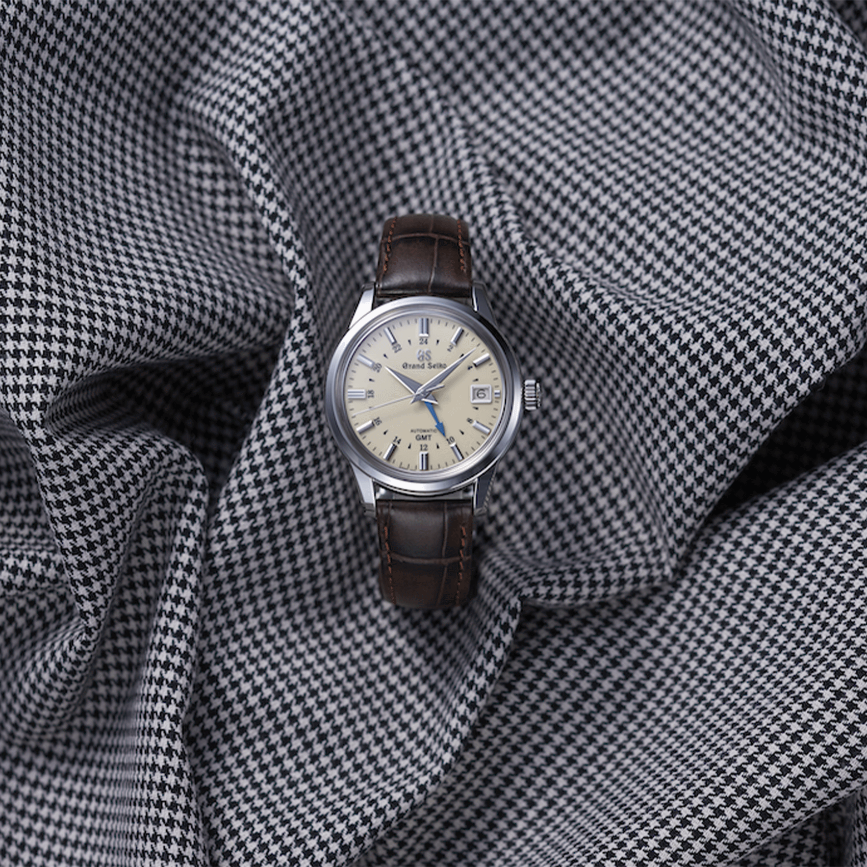 Montre Grand Seiko Elegance automatique GMT cadran ivoire bracelet cuir crocodile brun 39,5 mm