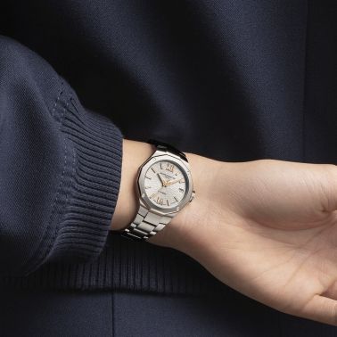 Montre Baume et Mercier Riviera quartz cadran doré bracelet acier 33 mm 10730