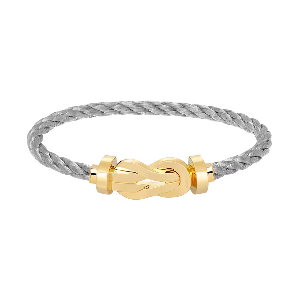 Bracelet Fred Chance Infinie grand modèle en or jaune et câble acier 0B0095-6B0110