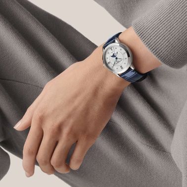 Montre Baume et Mercier Classima Moon Phase automatique index diamants cadran nacre blanche bracelet cuir bleu 34 mm 10633