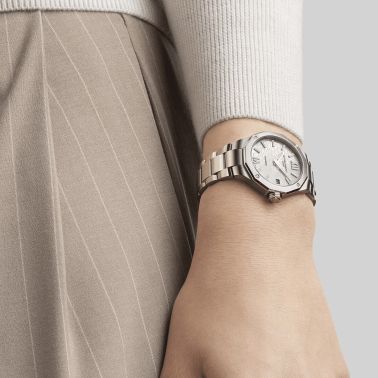 Montre Baume et Mercier Riviera Diamants quartz cadran blanc bracelet acier 33 mm 10729