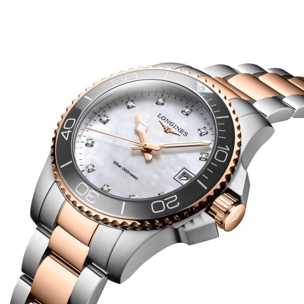 Longines Hydroconquest quartz watch diamond markers white mother-of-pearl dial steel bracelet and pink pvd 32 mm