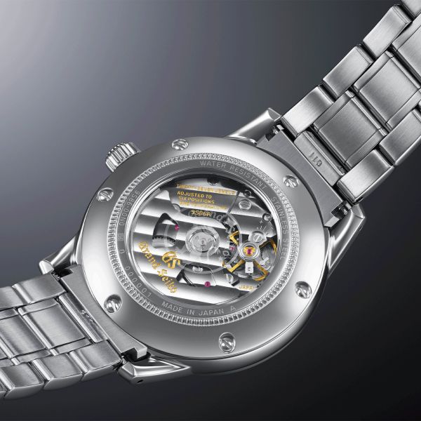 Montre Grand Seiko Elegance Hi-Beat 36000 GMT "Yuka Momiji" cadran rouge bracelet acier 39,5 mm