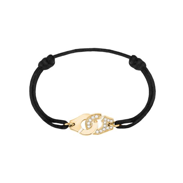 Menottes dinh van R10 bracelet in yellow gold and diamonds on cord