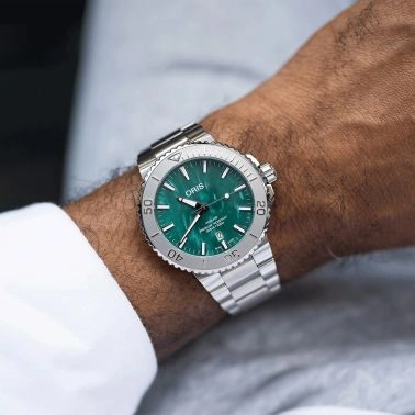 Montre Oris x Bracenet Aquis Date automatique cadran vert bracelet acier 43,5 mm