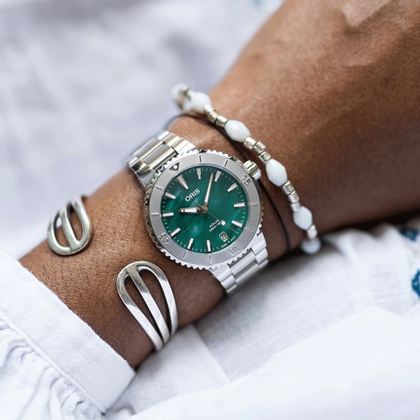 Montre Oris x Bracenet Aquis Date automatique cadran vert bracelet acier 43,5 mm