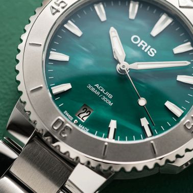 Montre Oris x Bracenet Aquis Date automatique cadran vert bracelet acier 43,5 mm