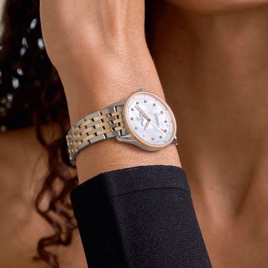 Breitling Navitimer quartz watch diamond index white mother-of-pearl dial steel and rose gold bracelet 32 mm U77320E61A1U1