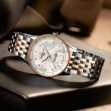 Breitling Navitimer quartz watch diamond index white mother-of-pearl dial steel and rose gold bracelet 32 mm U77320E61A1U1