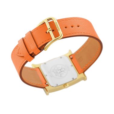 Montre HERMÈS Heure H Moyen Modèle PVD Or jaune quartz cadran blanc bracelet cuir orange 30 mm