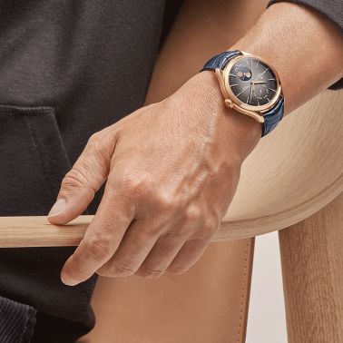 Montre Baume et Mercier Clifton Baumatic automatique cadran gris bracelet cuir alligator bleu et or rose 42 mm 10547