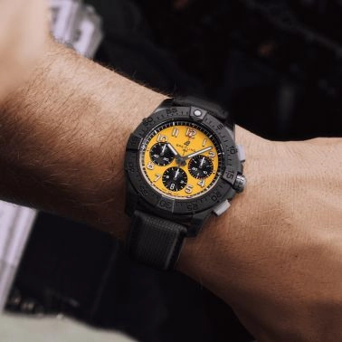 Breitling Avenger B01 Chronograph Night Mission automatic watch yellow dial black leather strap 44 mm