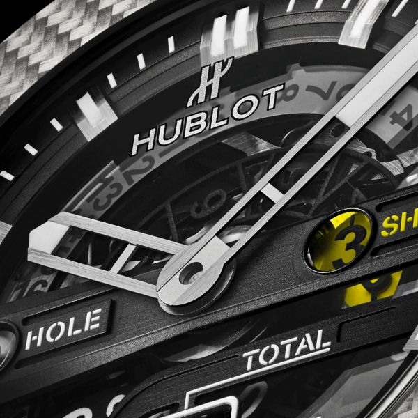 Montre Hublot Big Bang Unico Golf automatique cadran squelette bracelet caoutchouc noir et cuir blanc 45 mm 416.YS.1120.VR