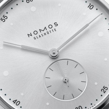 Nomos Metro All Silver mechanical watch sapphire back silver dial grey leather strap 33 mm 1122