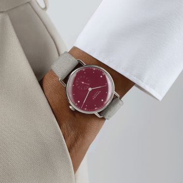Nomos Metro Muted Red mechanical watch stainless steel back red dial grey leather strap 33 mm 1123.SB