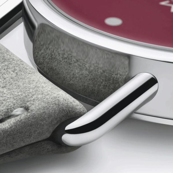 Montre Nomos Metro Muted Red mécanique fond saphir cadran rouge bracelet cuir gris 33 mm 1123