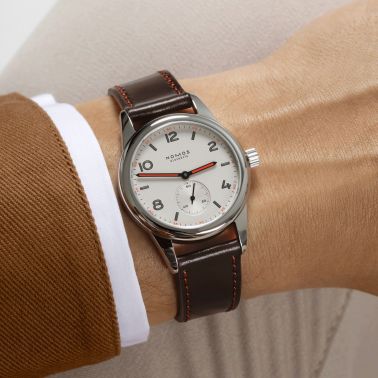 Nomos Club mechanical watch white galvanized dial brown leather strap 36 mm