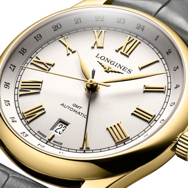 Montre Longines Master Collection GMT Or Jaune automatique cadran argent bracelet cuir gris 40 mm L2.844.6.71.2