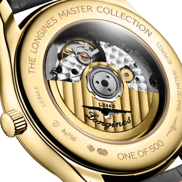 Montre Longines Master Collection GMT Or Jaune automatique cadran argent bracelet cuir gris 40 mm L2.844.6.71.2