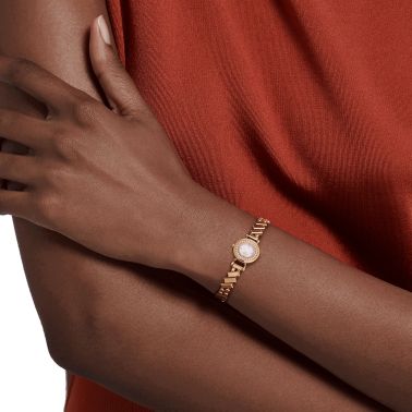 Montre HERMÈS Faubourg Polka Mini Modèle Or Rose quartz cadran nacre blanche bracelet or rose 15 mm W054184WW00