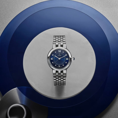 Montre Tudor Clair de Rose automatique index diamants et chiffres romains cadran bleu bracelet acier 34 mm M35800-0010