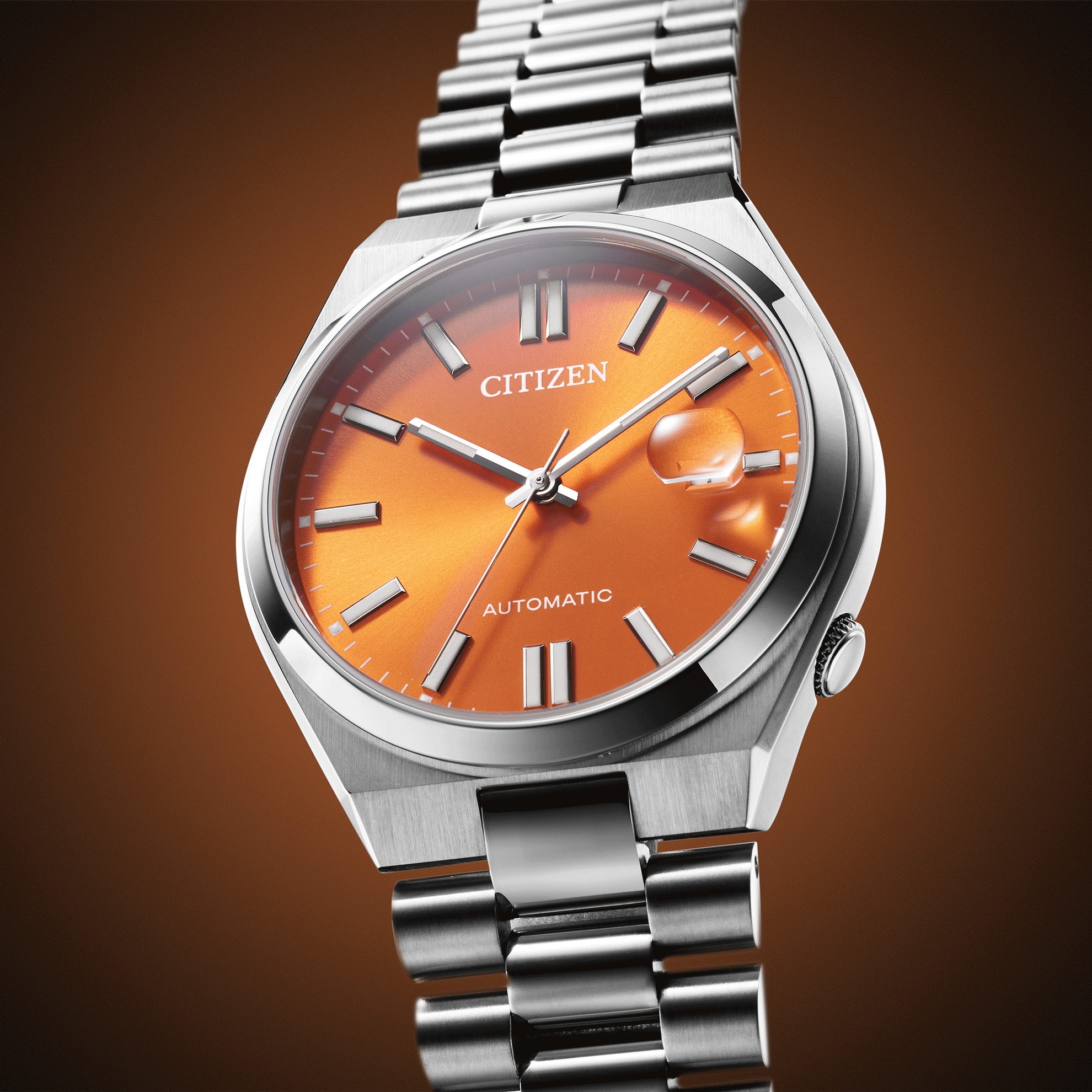 Montre Citizen Tsuyosa Magu automatique cadran orange bracelet acier 40 mm