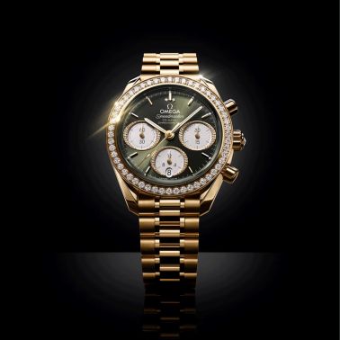 Montre Omega Speedmaster 38 Diamants Chronographe Co-Axial Chronometer automatique Or Moonshine cadran vert bracelet or jaune 38